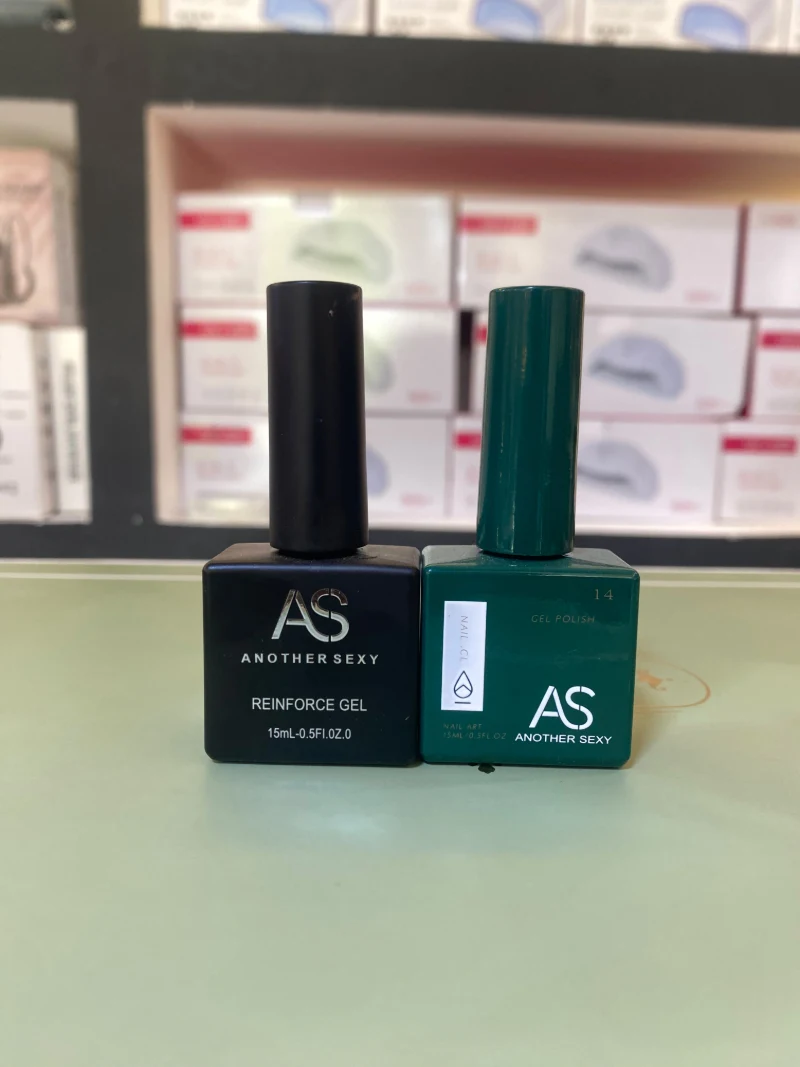 Two bottles of AS Another Sexy gel polish, including reinforce gel
