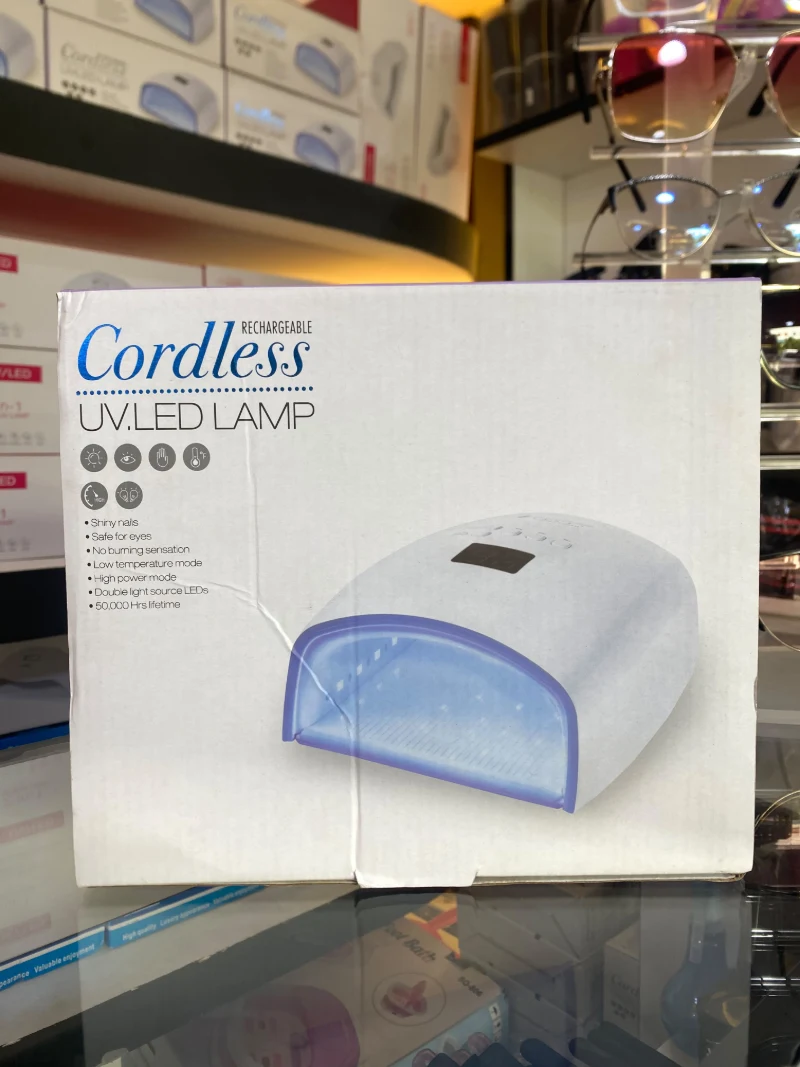 Cordless rechargeable UV/LED nail lamp in its box